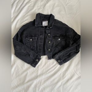 Distressed denim jacket